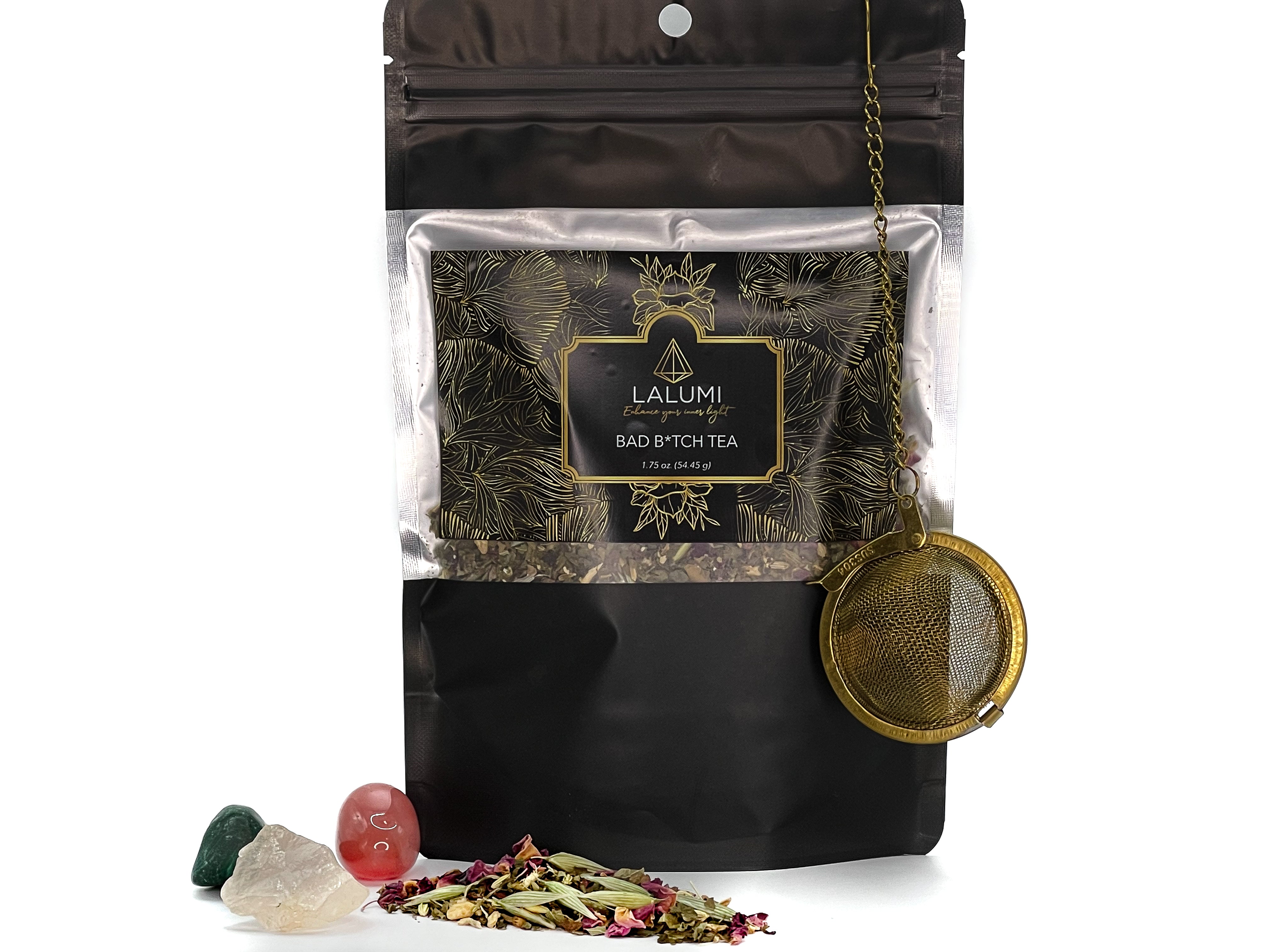 Image of Pouch of Bad B*tch Herbal Tea by LaLumi Herbes with a gold tea strainer and loose tea leaves on a white background