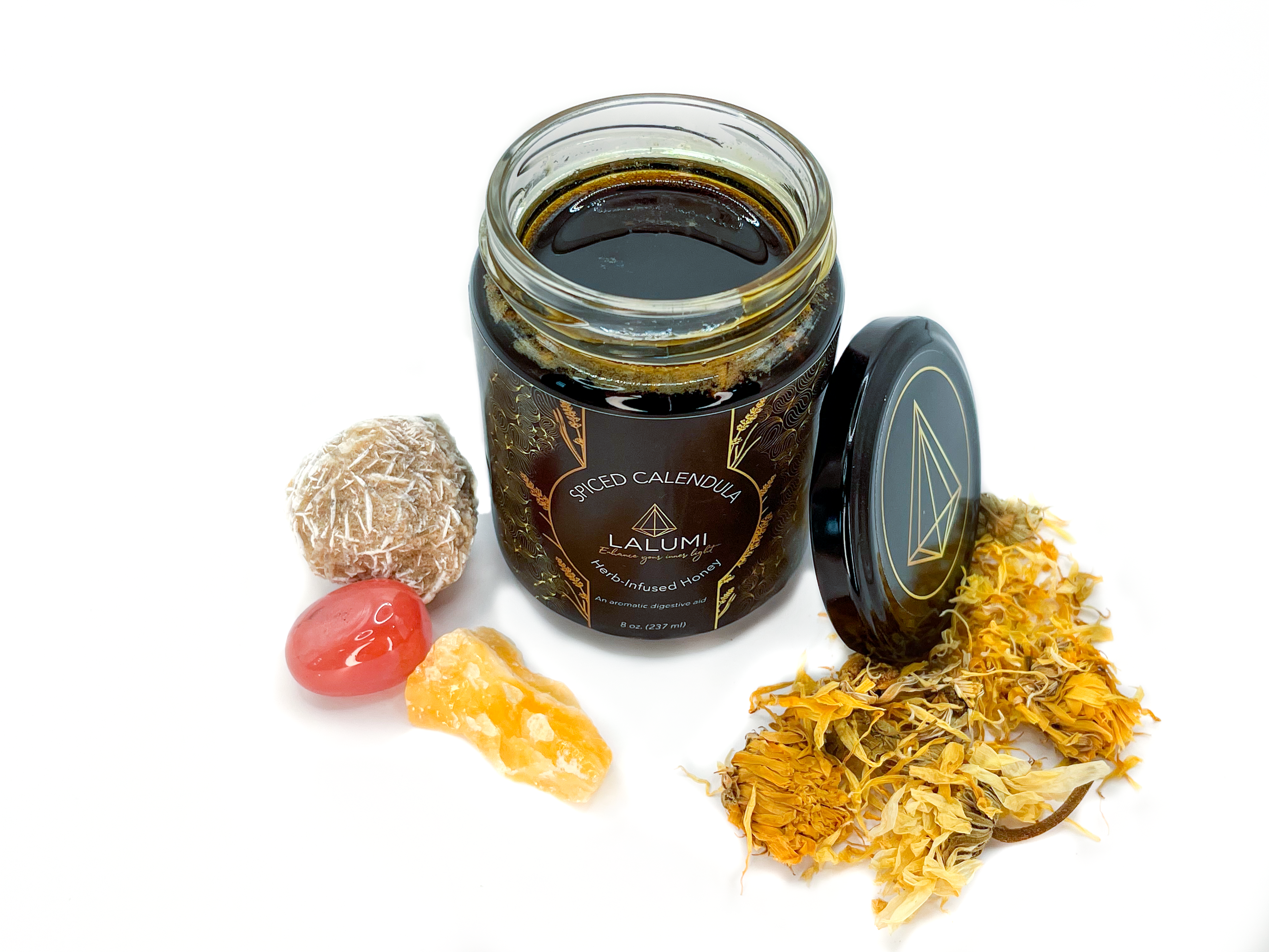 Image of Top view of 8 oz jar of Organic Calendula Spiced Honey limited edition by LaLumi Herbes