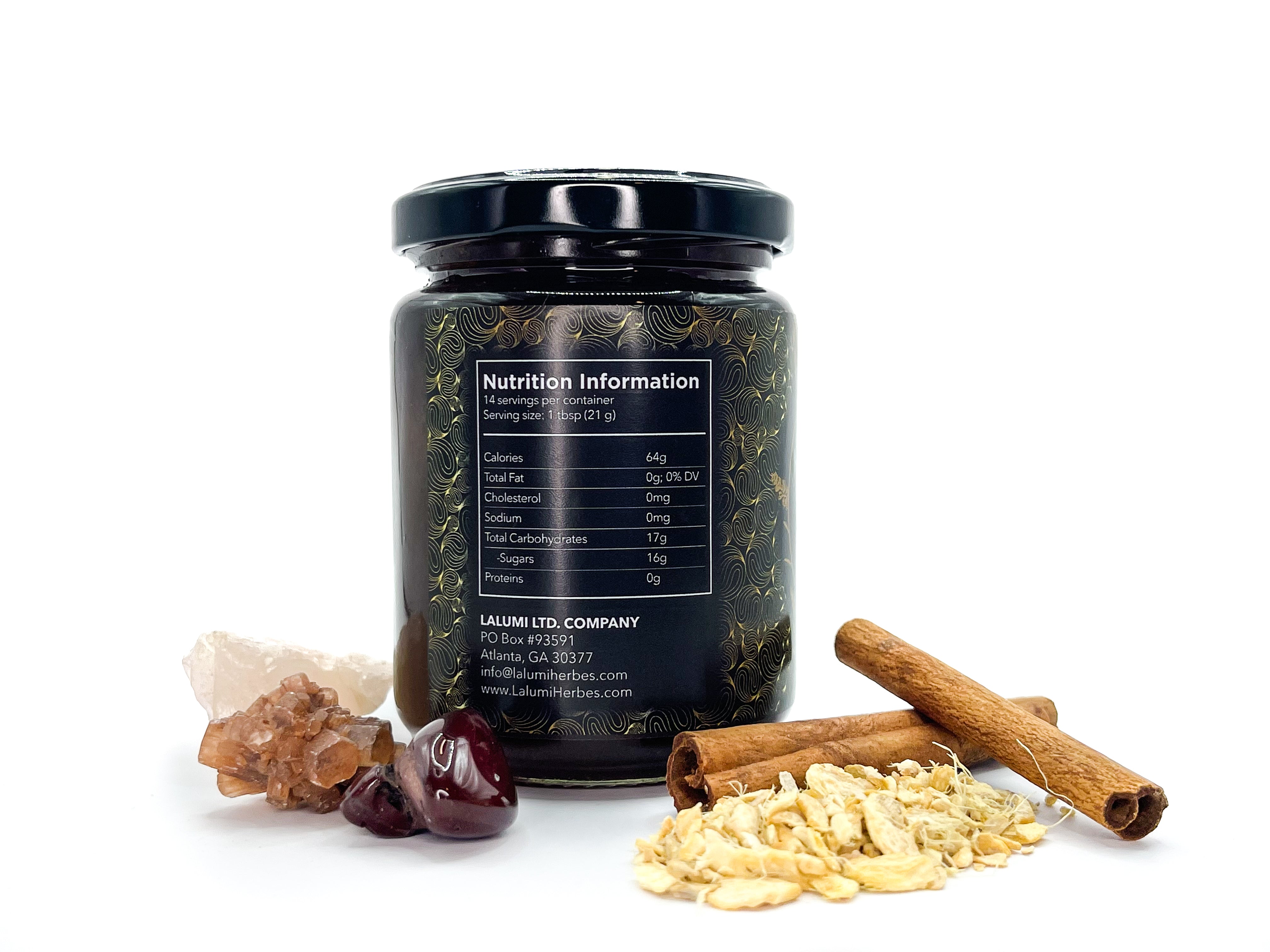 Image of 8 oz jar of Organic Cinnamon-Ginger Infused Local Honey by LaLumi Herbes with nutrition information label surrounded by spices and ingredients on a white background