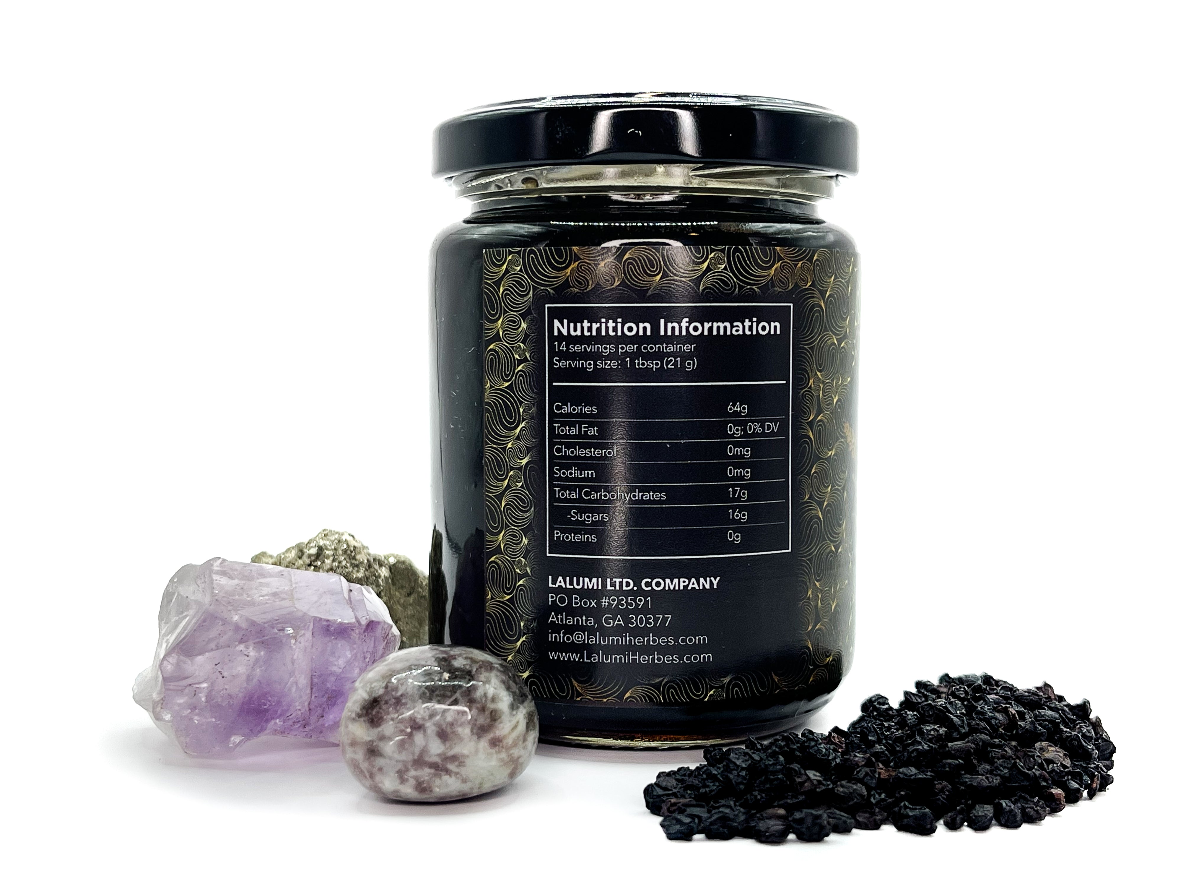 Image of Side view of 8 oz jar of Organic Elderberry Infused Local Honey by LaLumi Herbes with nutrition label, surrounded by amethyst crystals on a white background