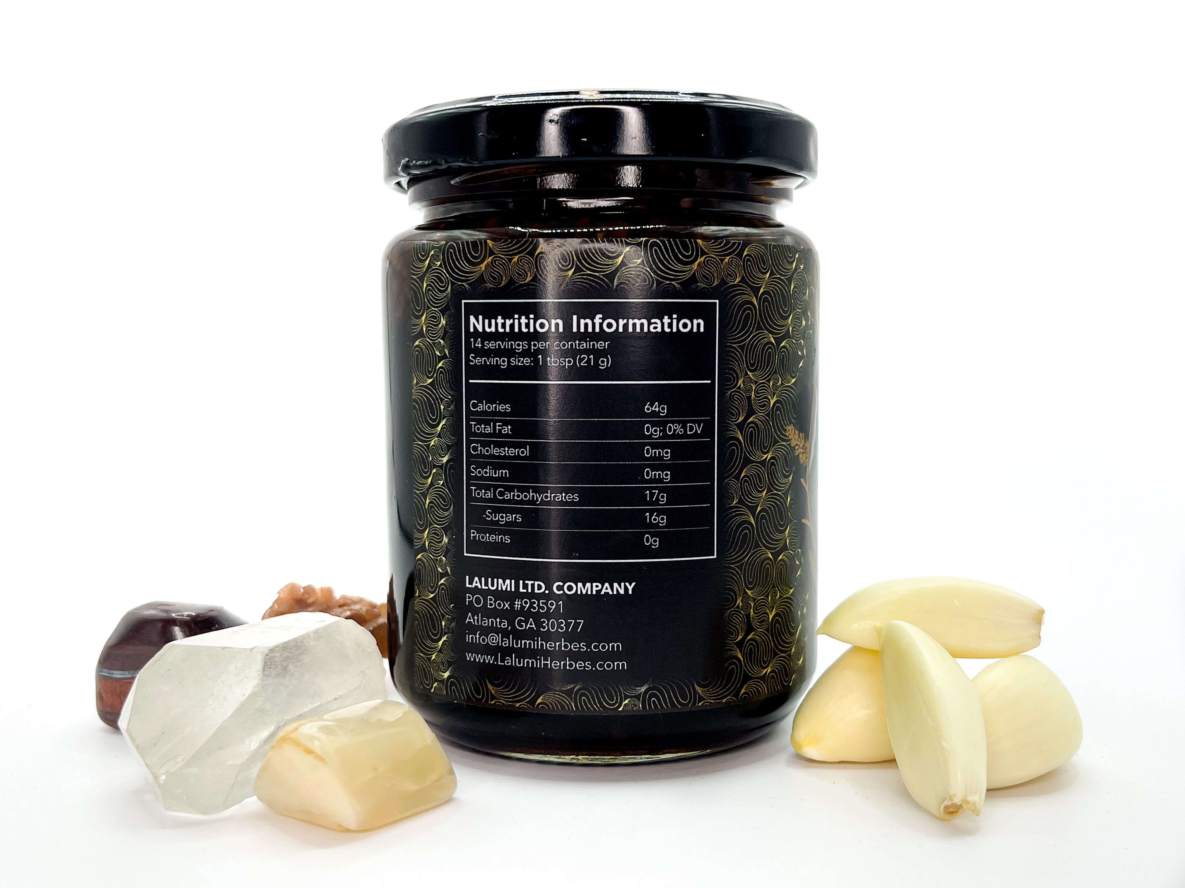 Image of 8 oz jar of Organic Garlic Infused Local Honey by LaLumi Herbes with view of nutrition information label on a white background
