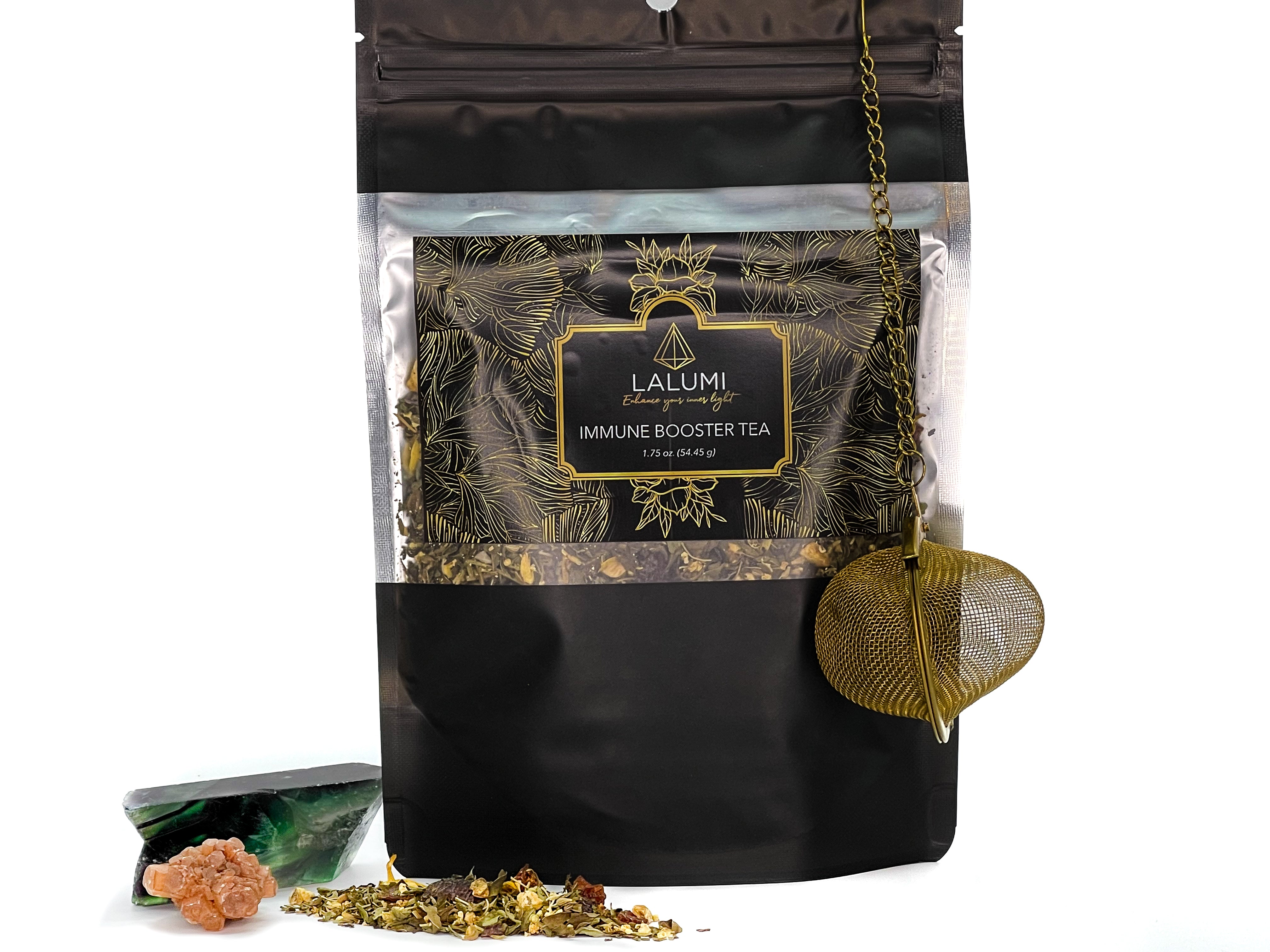 Image of Pouch of Organic Immune Booster Herbal Tea by LaLumi Herbes with gold leaf design and 'Lalumi' branding on a white background